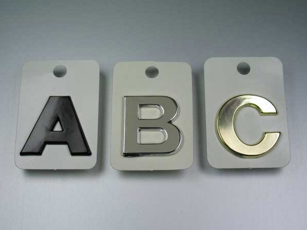 Buchstaben und Zahlen, 50 mm goldeloxiert Buchstaben und Zahlen, 50 mm goldeloxiert